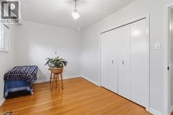 Wood-finish flooring with crisp white walls - 