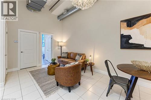 Tile flooring, high ceilings, exposed ductwork, built-in lighting, and interior doors - 25 Concession Street Unit# 110, Cambridge, ON 