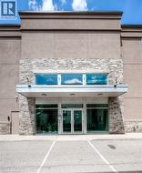 Stone facade with a modern awning - 
