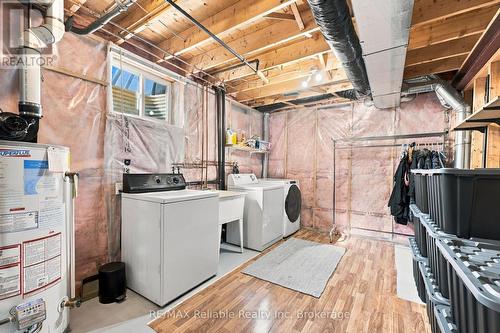 Lower level laundry and storage area. - 71 Meadowridge Road, London North (North M), ON 