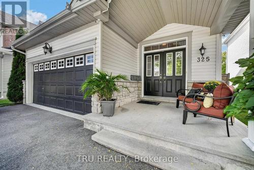 Generous covered front porch - 325 Upcountry Drive E, Ottawa, ON 