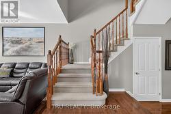 open stairs leading to upper level - 