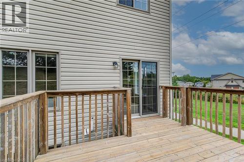 Expansive outdoor deck with wood railing, siding exterior, and sliding glass door - 226 Maitland Street, Kitchener, ON 