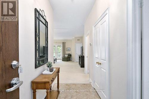 Front Entrace With Closet - 102 - 25 Beaver Street S, Blue Mountains, ON 