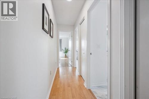 Corridor featuring light wood-style floors and baseboards - 47 Mccurdy Road, Guelph, ON 