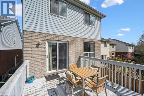 Wooden deck with outdoor dining area - 47 Mccurdy Road, Guelph, ON 