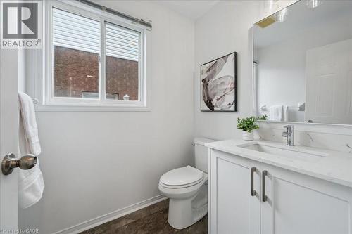 Bathroom with vanity and baseboards - 47 Mccurdy Road, Guelph, ON 