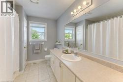 Extended vanity with an integrated sink and base cabinetry - 