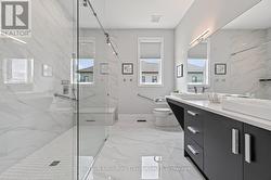 Primary Ensuite - 10' double shower - 