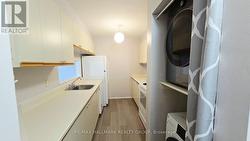 Kitchen with laundry area - 