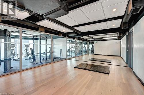 Wood-finish flooring, full-height wall mirrors, and recessed ceiling lighting - 60 Frederick Street Unit# 1213, Kitchener, ON 