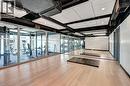 Wood-finish flooring, full-height wall mirrors, and recessed ceiling lighting - 60 Frederick Street Unit# 1213, Kitchener, ON 
