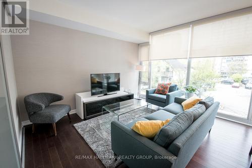 Living Room with Floor to Ceiling Windows - 201 - 300 Lisgar Street, Ottawa, ON 