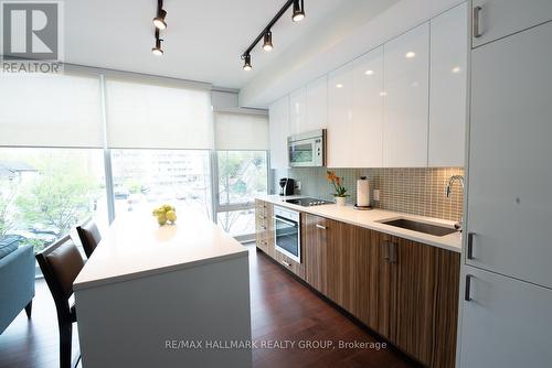 Kitchen with Quartz Counters & European Appliances - 201 - 300 Lisgar Street, Ottawa, ON 