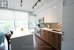 Kitchen with Quartz Counters & European Appliances - 