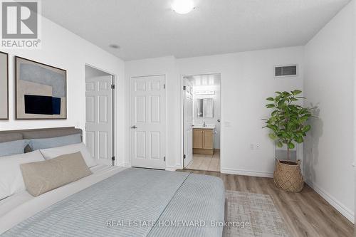 Virtually staged photo of Primary Bedroom - 1102 - 2800 Warden Avenue, Toronto, ON 