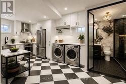 Virtually staged laundry RM combined with Kitchen - 