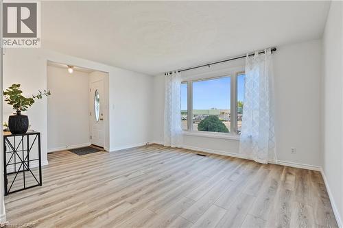 WOWZA! This OPEN plan living room will IMPRESS! - 589 Mohawk Road W, Hamilton, ON 