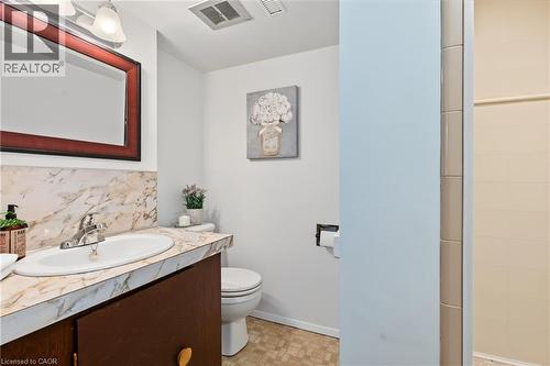 2nd BATHROOM; 3PC with vanity and convenient separate shower. - 589 Mohawk Road W, Hamilton, ON 