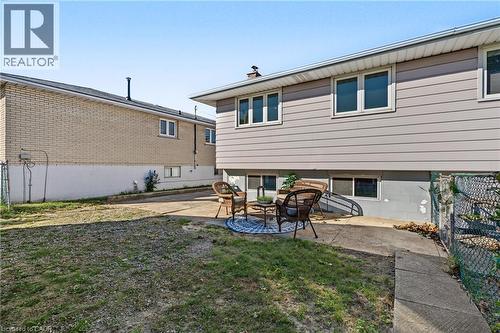 SWEET rear yard patio with space for BBQ'g and relaxing after a long day! - 589 Mohawk Road W, Hamilton, ON 