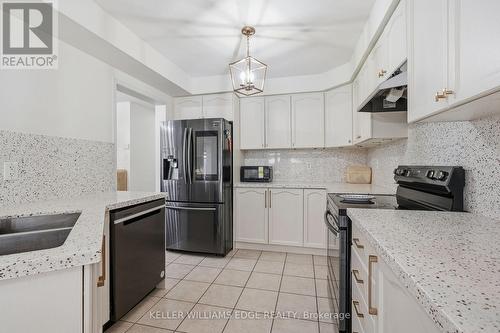 Kitchen w/ Stainless Steel Appliances - 4828 Verdi Street, Burlington, ON 