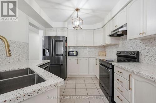 Kitchen w/ Stainless Steel Appliances - 4828 Verdi Street, Burlington, ON 