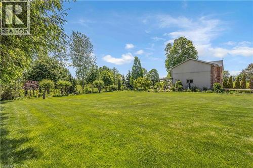 Expansive green lawn providing ample open space - 302 German School Road, Paris, ON 