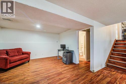 Wood-finish flooring throughout the space - 143 Sunrise Place, Kitchener, ON 