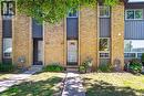 Multi-story facade featuring stacked stone and vertical siding - 1517 Elm Road Unit# 9, Oakville, ON 