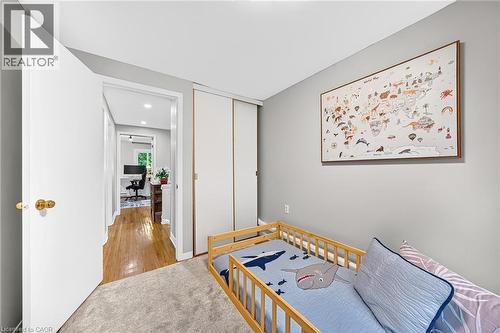 Light gray walls complement the neutral carpeting - 1517 Elm Road Unit# 9, Oakville, ON 
