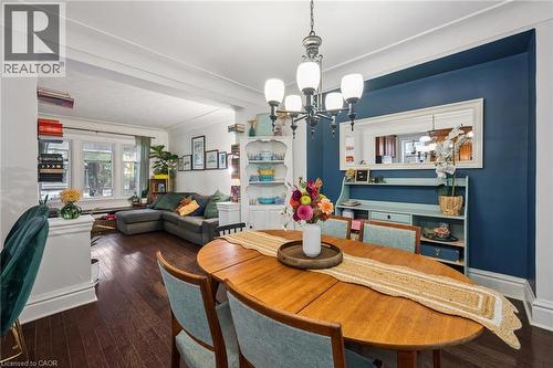 Hardwood flooring extends through the open living areas - 58 Balmoral Avenue N, Hamilton, ON 