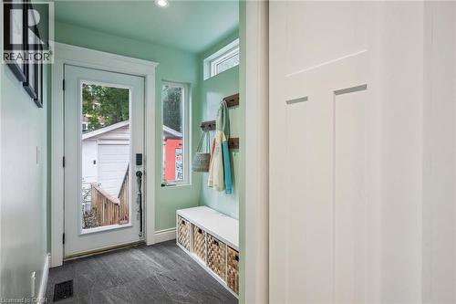 Bright mudroom entry featuring recessed lighting, closet, and dark slate tile flooring - 58 Balmoral Avenue N, Hamilton, ON 