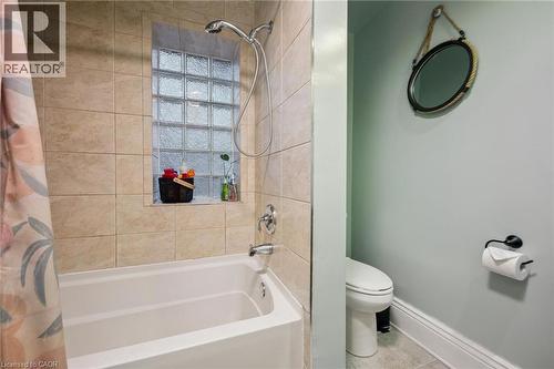 Deep tub with integrated glass block window - 58 Balmoral Avenue N, Hamilton, ON 