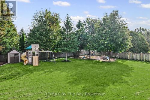 Large Fenced Backyard with In- Ground Sprinklers - 2 Red Oak Drive, Wasaga Beach, ON 