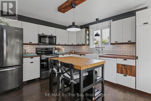 Kitchen Area with Island - 2 Red Oak Drive, Wasaga Beach, ON 