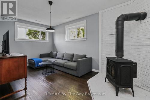 Lower Level Rec Room with Gas Fireplace - 2 Red Oak Drive, Wasaga Beach, ON 