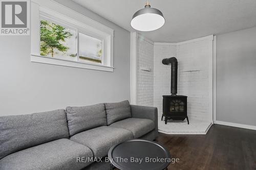 Gas Fireplace Feature in Rec Room - 2 Red Oak Drive, Wasaga Beach, ON 
