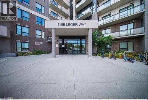 Entrance to property featuring brick siding - 1105 Leger Way Unit# 329, Milton, ON 