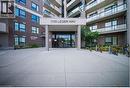Entrance to property featuring brick siding - 1105 Leger Way Unit# 329, Milton, ON 