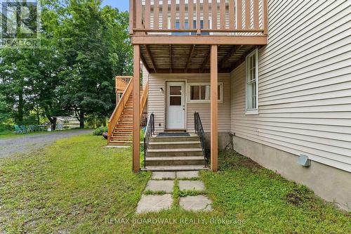 Back deck off the kitchen, great for the BBQ - 110-112-114 Clothier Street E, North Grenville, ON 