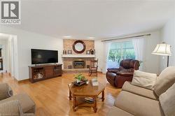 Warm hardwood flooring extends throughout - 