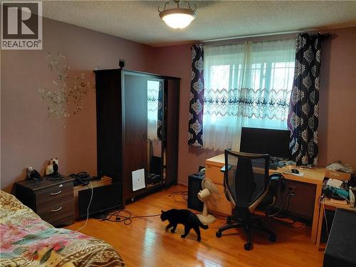 Wood-finish flooring throughout - 244 Guildwood Drive, Hamilton, ON 