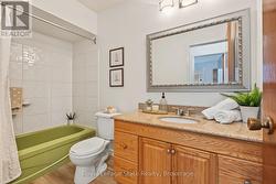 4PC Bath with NEW vinyl flrg, updated lg vanity. - 