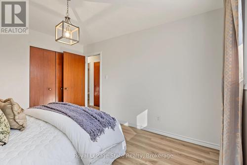 PRIMARY bedroom with closet, window & NEW flrg - 589 Mohawk Road W, Hamilton (Gilbert), ON 