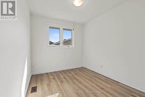 BEDROOM 3; closet, window & NEW vinyl flooring - 589 Mohawk Road W, Hamilton (Gilbert), ON 