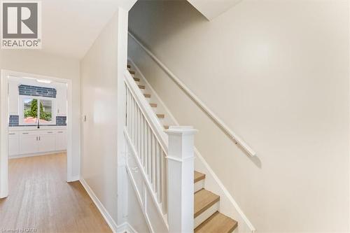 Staircase with wood-finish treads and white risers - 17 Craigmiller Avenue, Hamilton, ON 