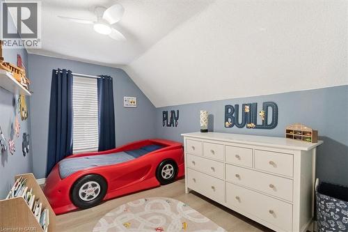 Vaulted ceiling with a flush-mount ceiling fan and recessed lighting - 17 Craigmiller Avenue, Hamilton, ON 