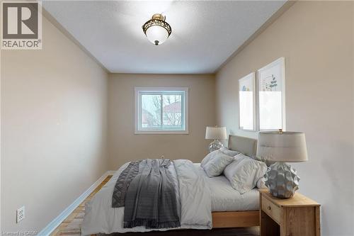 Recessed window with white trim, wood-finish flooring, and a ceiling-mounted light fixture - 21 Eastview Gate Unit# 36, Brampton, ON 