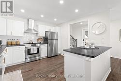 White Kitchen, Stainless Steel Appliances - 