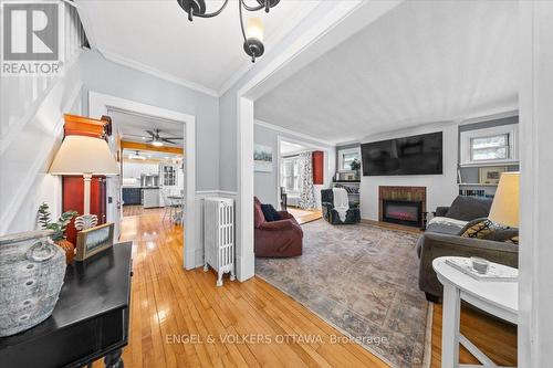 Spacious living area with fireplace - 57 King Street, North Dundas, ON 